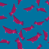 Seamless random pattern with bright pink colored cockatoo parrot shapes. Blue background. Zoo backdrop.