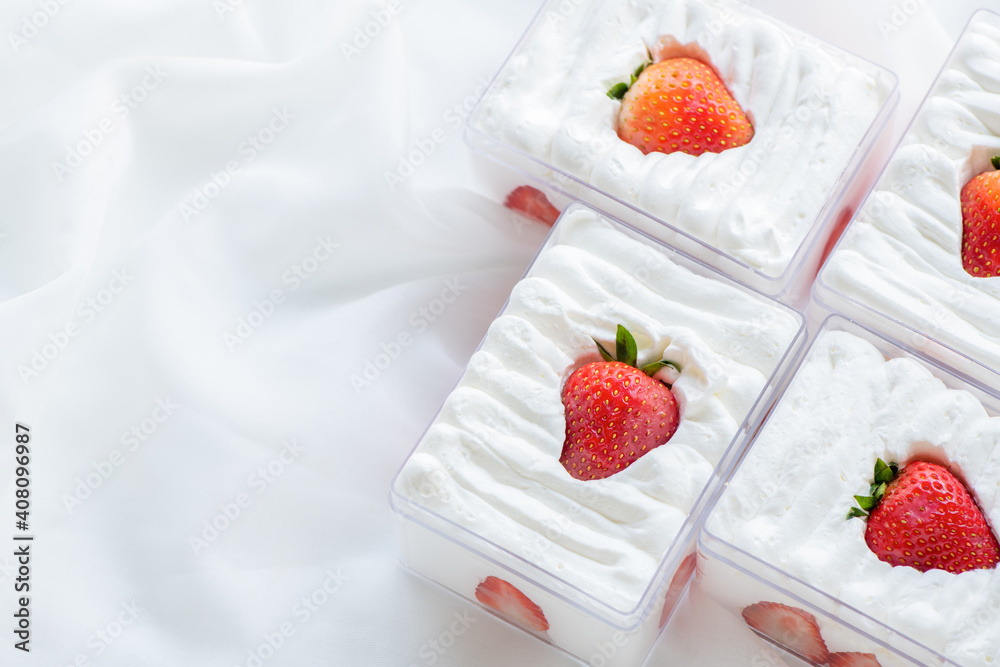 strawberry shortcake in plastic box on with cloth background and copy space, strawberry shortcake in plastic box on with cloth background and copy space,