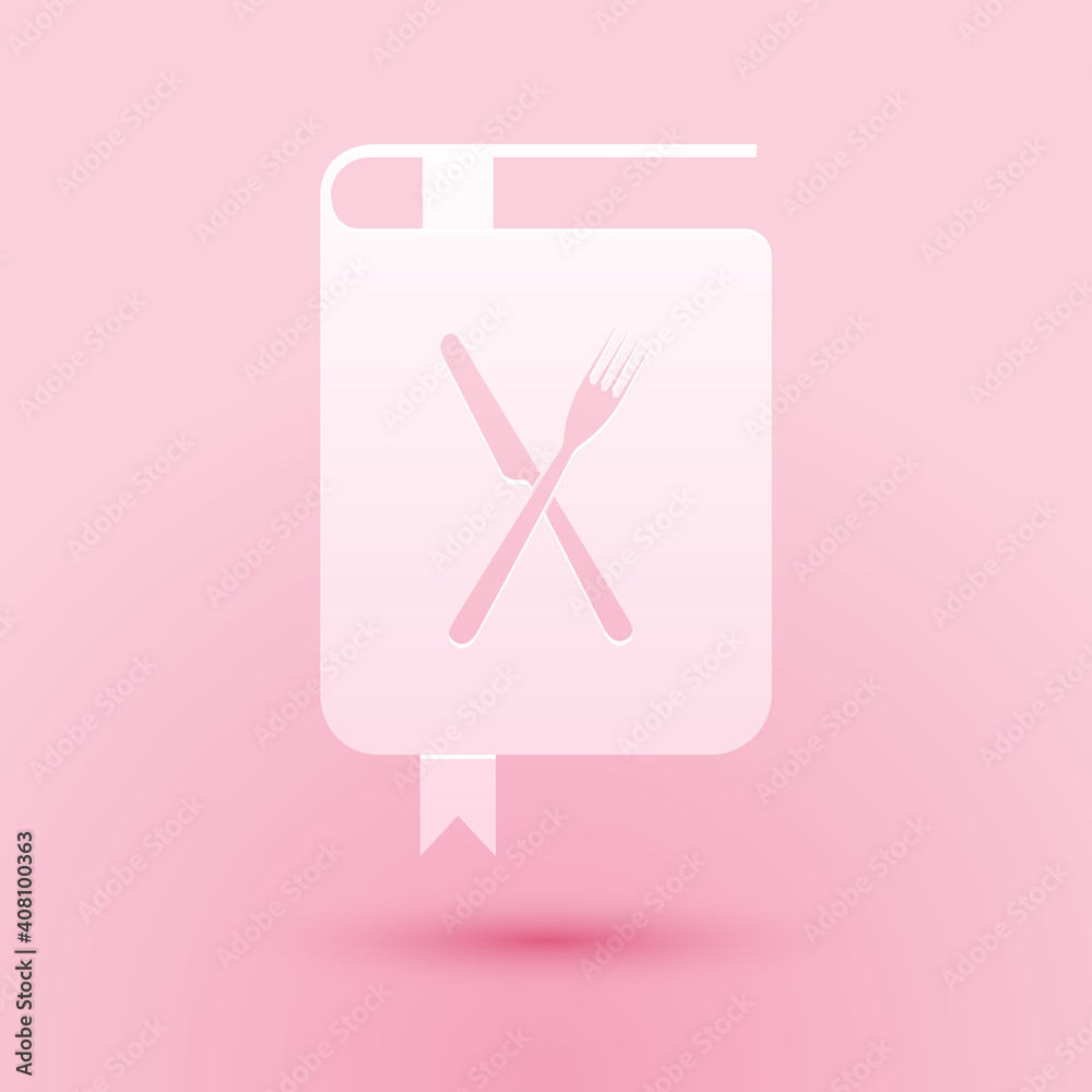 Obraz premium Paper cut Cookbook icon isolated on pink background. Cooking book icon. Recipe book. Fork and knife icons. Cutlery symbol. Restaurant symbol. Paper art style. Vector.