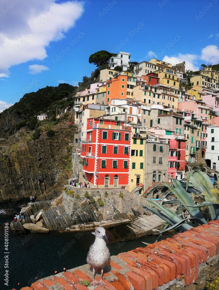 Beautiful colorful Riomaggiore - part of the Cinque Terre coastline in Italy

Riomaggiore, Italy - October 7th 2019
