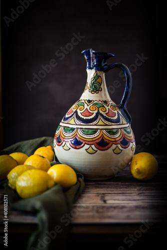 still life with vase and lemons