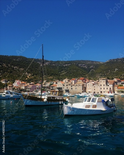 Fishing boat in Komiža bayKomiža, Vis - July 1st 2020