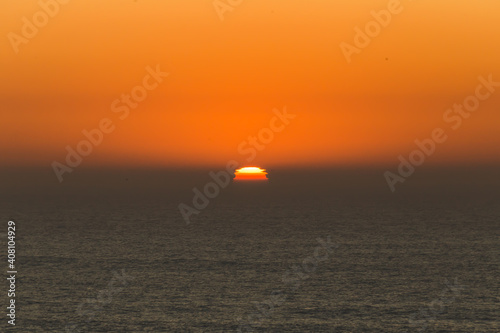  orange sunset on the sea © Bruna
