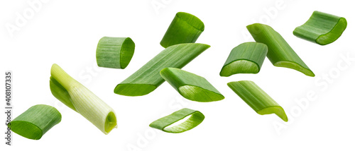 Falling green onion slices, cut chives isolated on white background photo