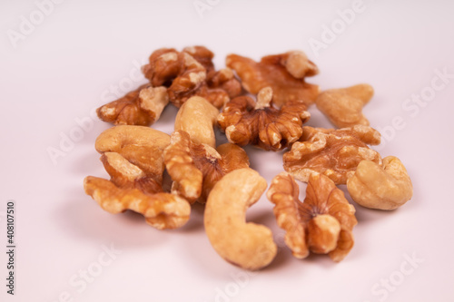 peeled walnuts mixed with cashews
