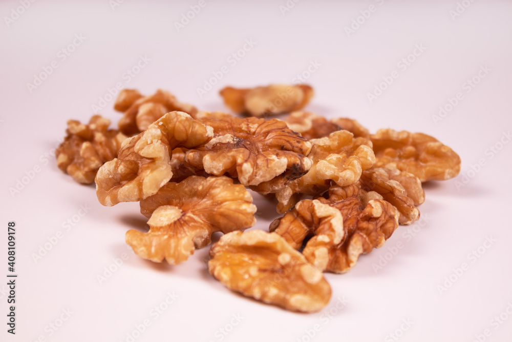 front view of a bunch of peeled walnuts front view of a bunch of peeled walnuts