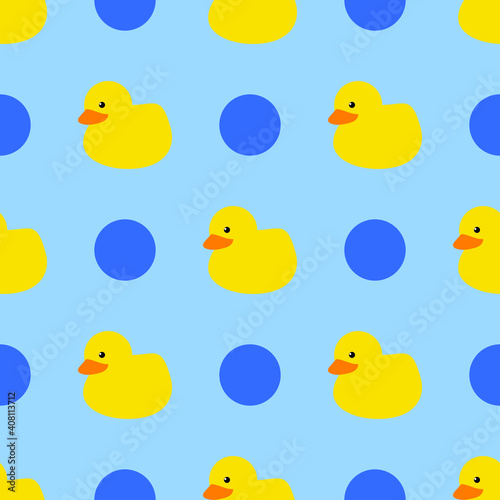 Yellow rubber duck bath time with blue dots seamless repeating background pattern
