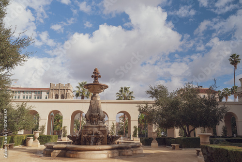 This image shows the Pasadena City Hall courtyard against beautiful clouds and blue sky. © angeldibilio