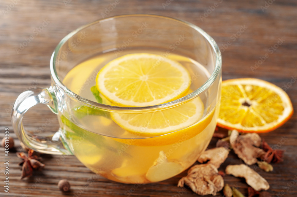 Ginger tea with lemon, spices and peppermint Ginger tea with lemon, spices and peppermint