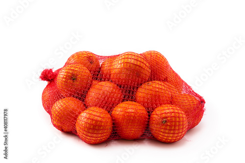Mesh bag of fresh oranges isolated on white backgorund