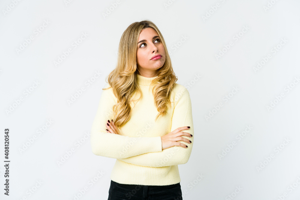 Young caucasian blonde woman tired of a repetitive task. Young caucasian blonde woman tired of a repetitive task.