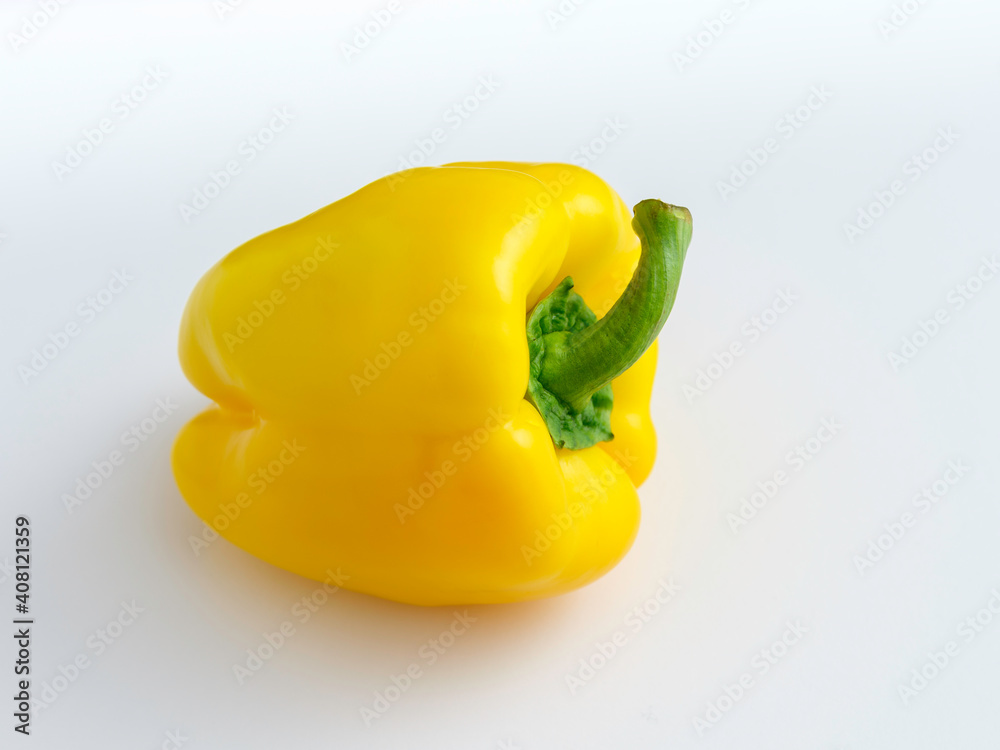 Yellow Bell Pepper Placed Sideways on White Background Yellow Bell Pepper Placed Sideways on White Background