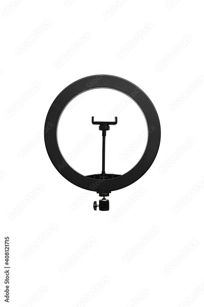 Closeup of circular neon LED lamp isolated white background. Popular modern light for make-up and beauty portraits. Closeup of circular neon LED lamp isolated white background. Popular modern light for make-up and beauty portraits.