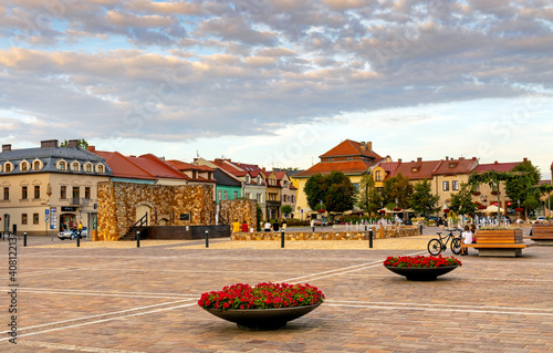 Fototapeta Naklejka Na Ścianę i Meble -  Panoramic view of Olkusz market square with historic tenement houses in Beskidy mountain region of Lesser Poland