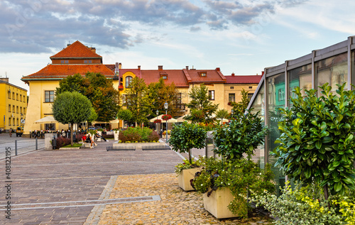 Fototapeta Naklejka Na Ścianę i Meble -  Panoramic view of Olkusz market square with historic tenement houses in Beskidy mountain region of Lesser Poland