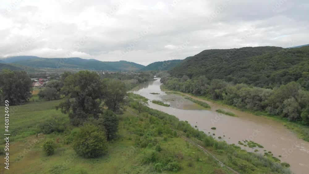Aerial drone shooting on a mountain river in the Carpathians. Aerial drone shooting on a mountain river in the Carpathians.