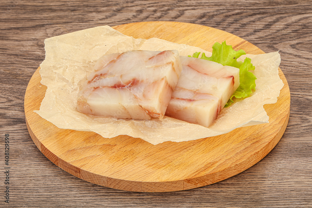 Raw pollock fish fillet for cooking Raw pollock fish fillet for cooking