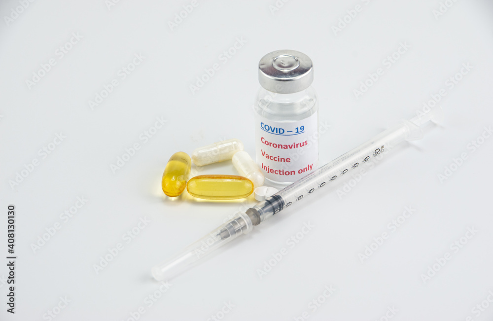 Medical syringe and pills with vaccine for COVID - 19 Coronavirus Medical syringe and pills with vaccine for COVID - 19 Coronavirus
