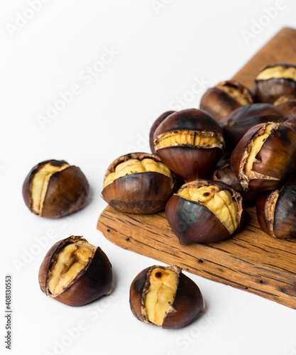 Roasted chestnut on white background.