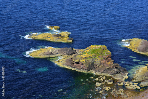Rock cliffs on the coast near the Stoer Head (Rubha Stoer in Scots Gaelic), it is a point of land north of Lochinver in Sutherland, NW Scotland, UK photo