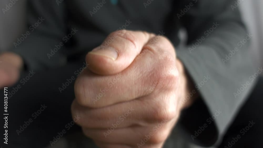 Button hand gesture with thumb pressed onto fingers as if pressing a button. Used when speaking to reinforce backup a point or position in a discussion, argument or debate. Popular with politicians.