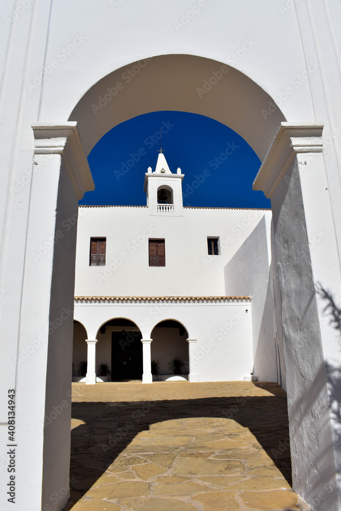 Obraz premium Ibiza, Spain - January 17, 2021: Ibiza San Miguel Sant Miquel de Balansat white Mediterranean church on a sunny day..