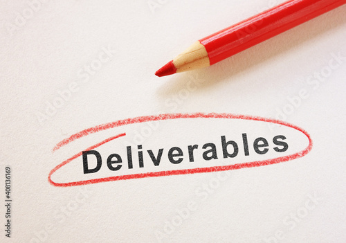 Deliverables text circled in red pencil on paper photo