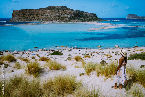 Crete Greece, Balos lagoon on Crete island, Greece. Tourists relax and bath in crystal clear water of Balos beach. Greece photo