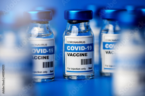 covid-19 vaccine - coronavirus vaccination bottles. injection vials