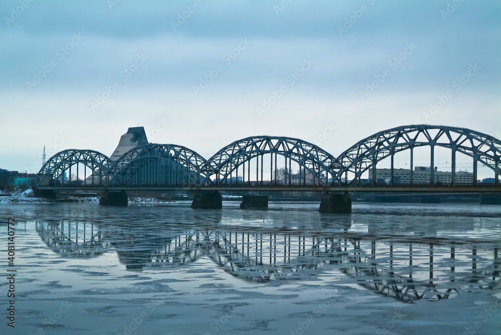 Fototapeta premium Riga,the embankment of the city. in the background is a river and a railway bridge