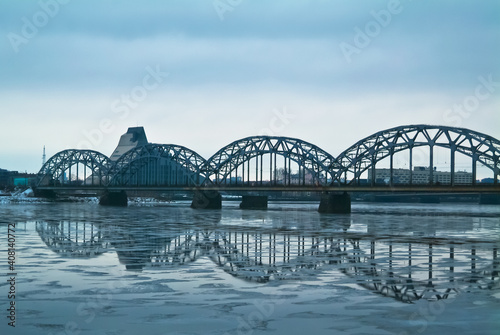 Riga,the embankment of the city. in the background is a river and a railway bridge