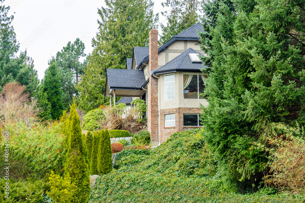 Fragment of a house with nice outdoor landscape in Vancouver, Canada. Fragment of a house with nice outdoor landscape in Vancouver, Canada.