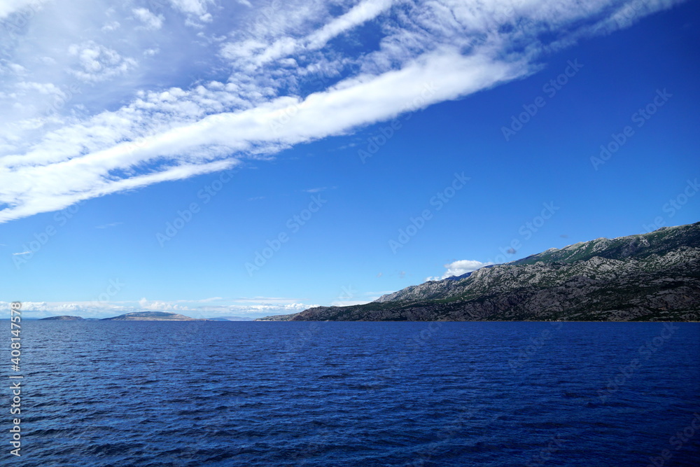 Cirrocumulus clouds on the blue sky in the beautiful seaside