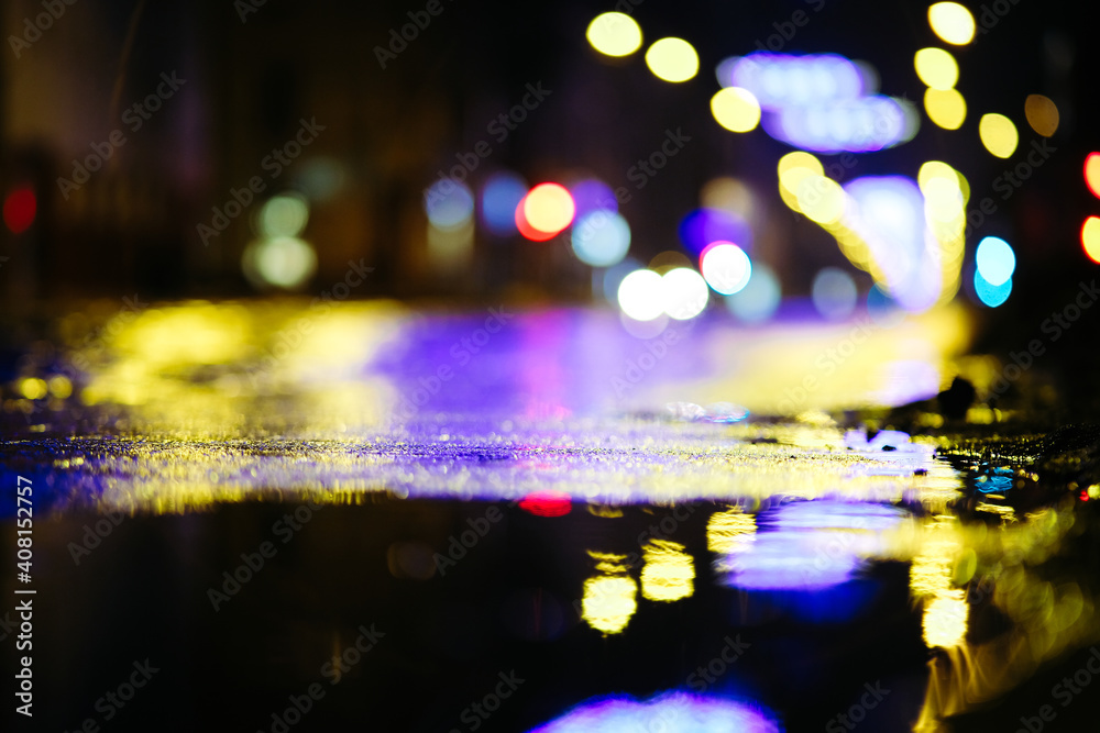 Beautiful night city lights and traffic lights, public transportation in night. Blurred background. Selective focus