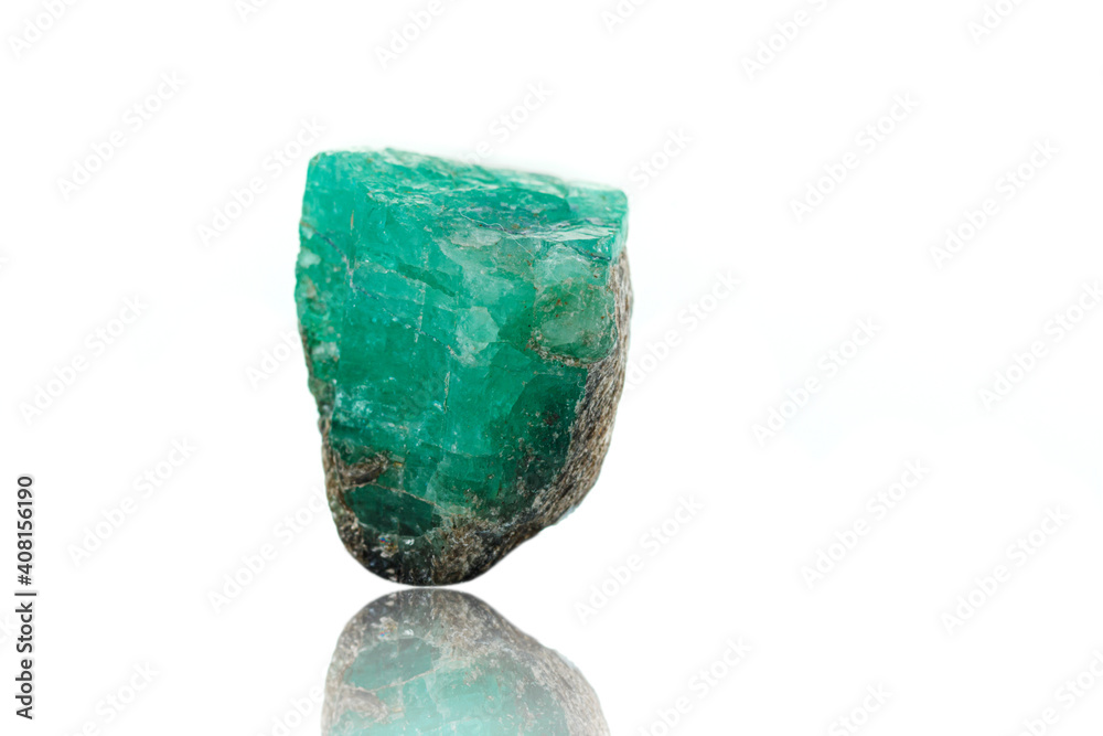 macro mineral stone emerald on a white background macro mineral stone emerald on a white background