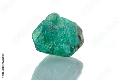 macro mineral stone emerald on a white background