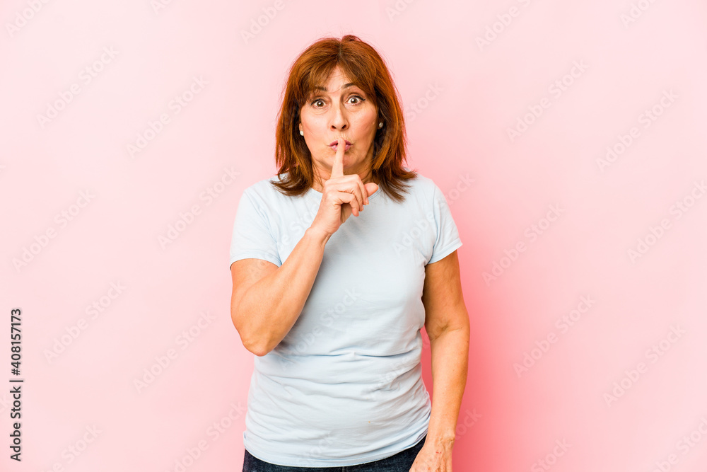Senior caucasian woman isolated keeping a secret or asking for silence. Senior caucasian woman isolated keeping a secret or asking for silence.