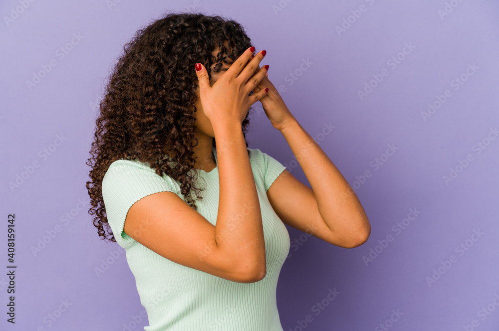 Young african american afro woman isolated afraid covering eyes with hands. Young african american afro woman isolated afraid covering eyes with hands.