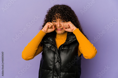 Young african american afro woman isolated whining and crying disconsolately. photo