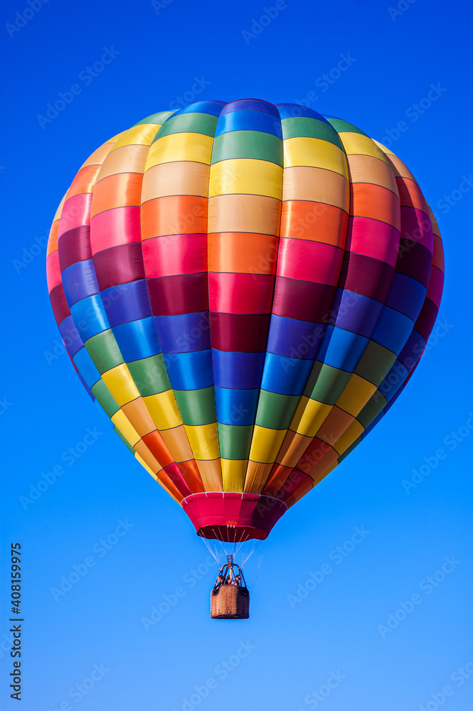 Fototapeta premium Multicolor Hot Air Balloon in Flight