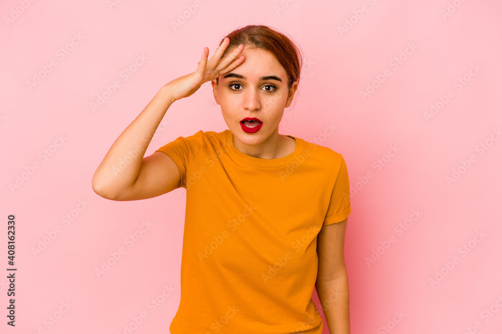Young arab mixed race woman shouts loud, keeps eyes opened and hands tense. Young arab mixed race woman shouts loud, keeps eyes opened and hands tense.