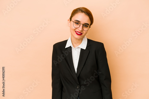 Young skinny caucasian business woman isolated happy, smiling and cheerful.