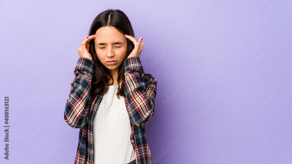 Young mixed race hispanic woman isolated touching temples and having headache. Young mixed race hispanic woman isolated touching temples and having headache.