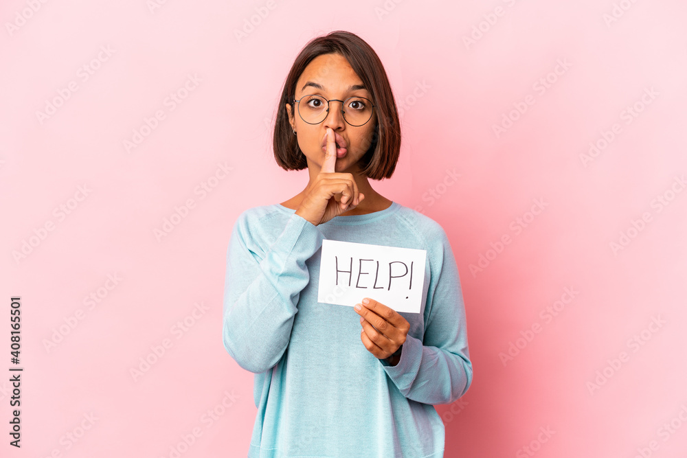 Young hispanic mixed race woman holding a help poster keeping a secret or asking for silence. Young hispanic mixed race woman holding a help poster keeping a secret or asking for silence.