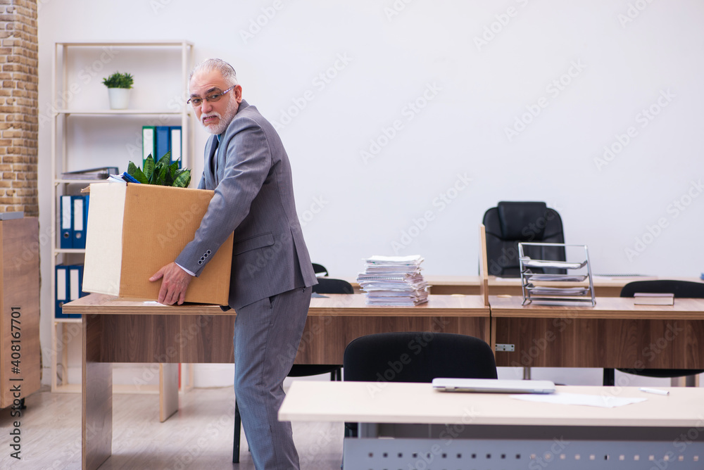 Old male employee being fired from his work Old male employee being fired from his work
