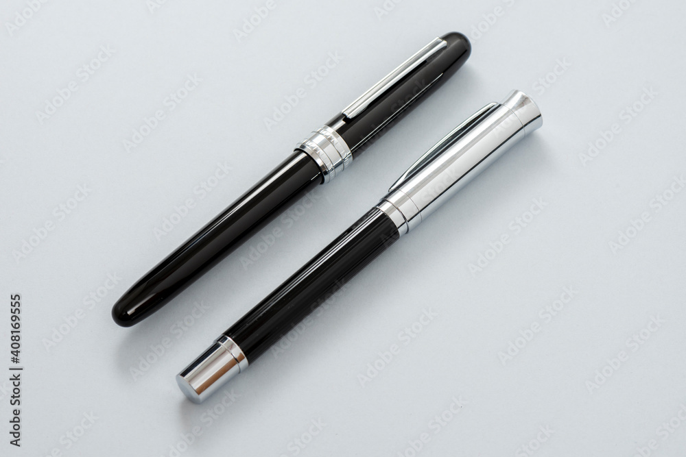 Metallic signature pens on the gray background. Metallic signature pens on the gray background.
