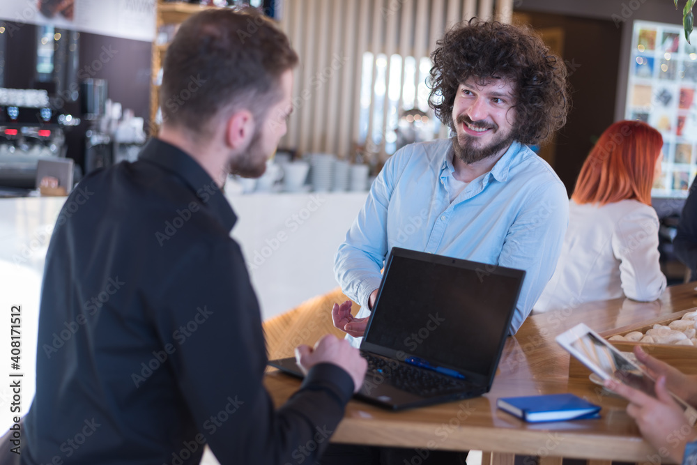 Business Team Coworkers discussing and Working Planning Start Up inside modern Cafe bar. Startup Diversity Teamwork Brainstorming Meeting Concept. Business Team Coworkers discussing and Working Planning Start Up inside modern Cafe bar. Startup Diversity Teamwork Brainstorming Meeting Concept.