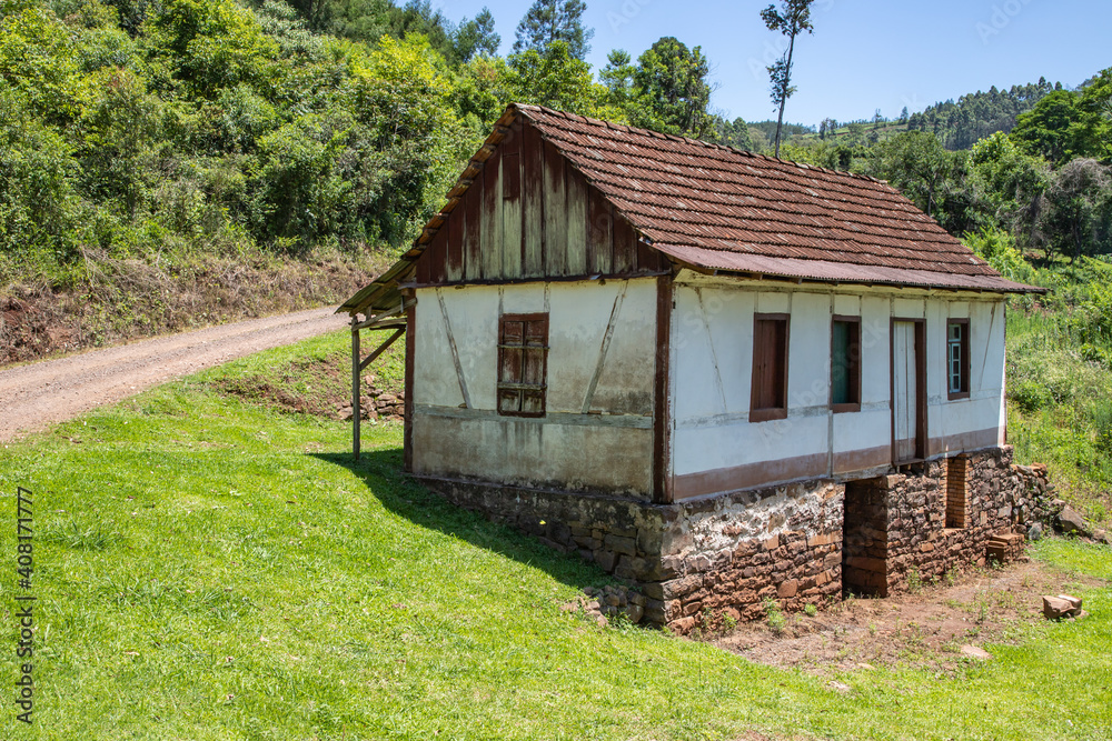 Small enxaimel house with vegetation around Small enxaimel house with vegetation around