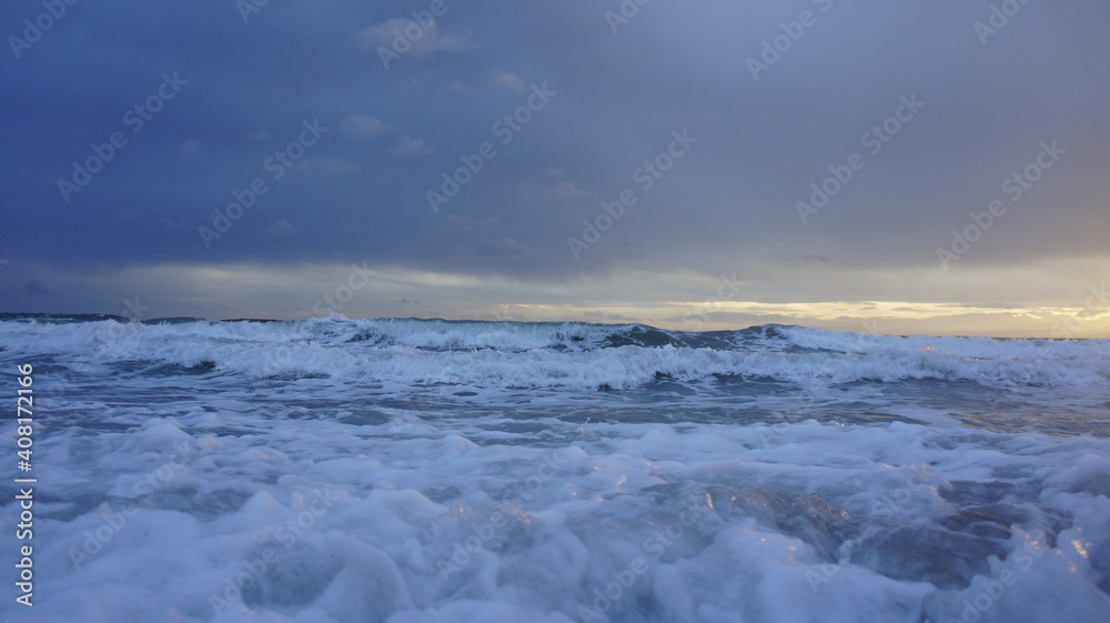 stormy sunset over the winter Mediterranean sea stormy sunset over the winter Mediterranean sea