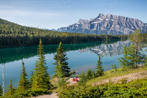 Clear lake water and clear sky at Two Jack Lake in the mountains at Banff National Park. Canada  © Tammi Mild